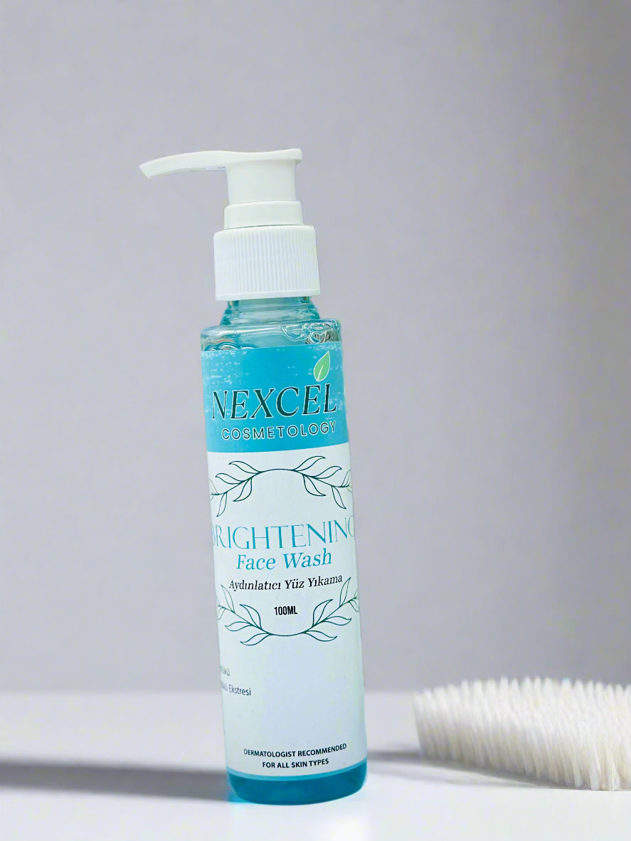 Nexcel Face Wash bottle with green leaves in the background